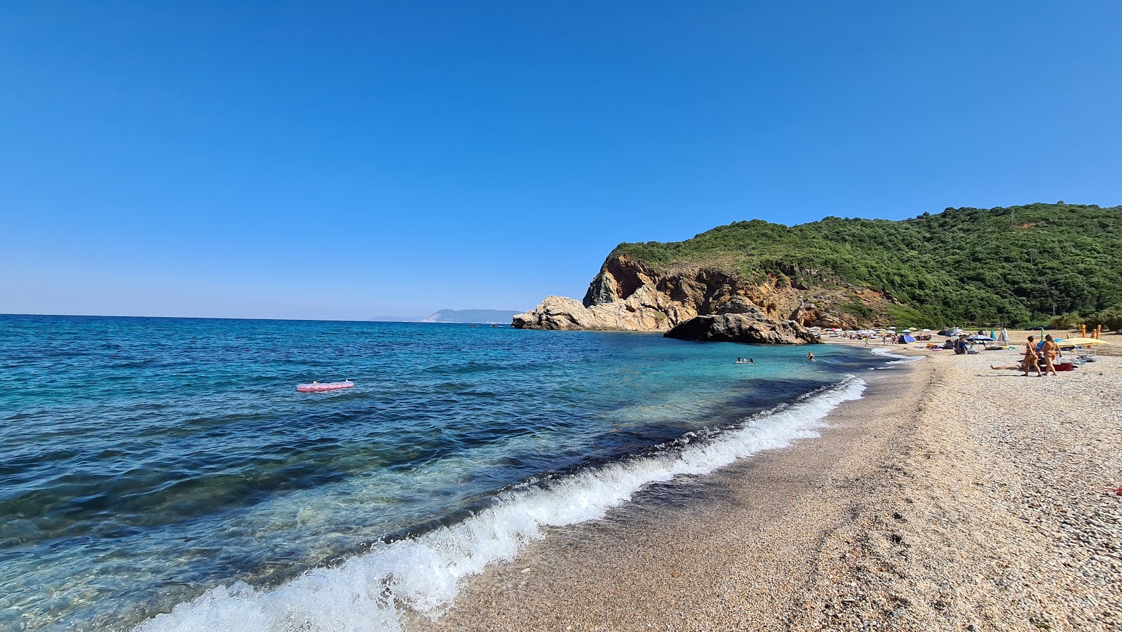 Foto av Palsi beach med turkos rent vatten yta