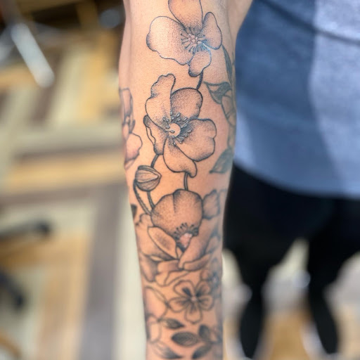 Explore tattoo ideas for men half sleeve, creative tattoo ideas in Glenside, available at Iron Will Tattoo Club