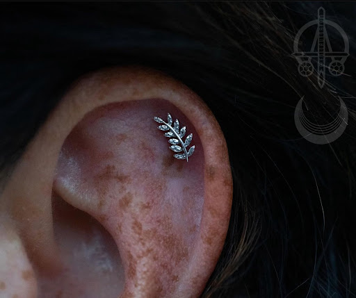 Explore wednesday addams tattoo ideas, creative tattoo ideas in Roanoke, available at Clove Piercing & Fine Jewelry