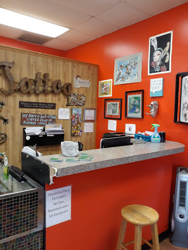 Tattoo Shop «The Lizard Lounge Tattoo Kissimmee», reviews and photos, 4519 S Orange Blossom Trail, Kissimmee, FL 34746, USA