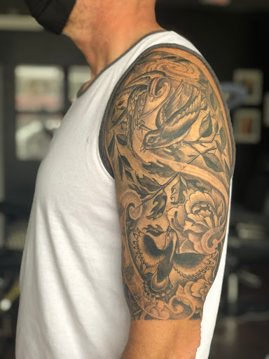 Explore deaf tattoo ideas, creative tattoo ideas in Scarsdale, available at Damm Nice Tattoo & Body Art