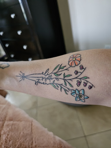 Explore cover up tattoo ideas male arm, creative tattoo ideas in Ocoee, available at Fine Ink Studios Tattoos