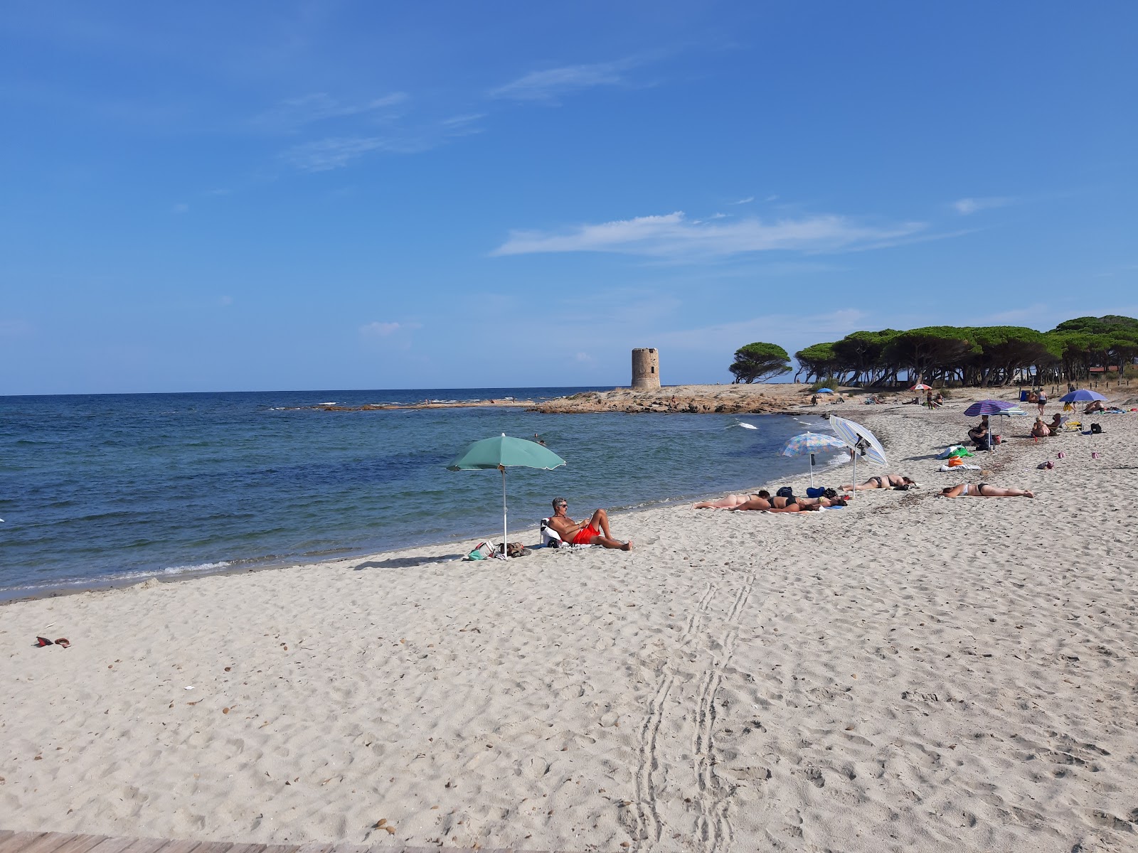 Foto av Spiaggia di Torre San Giovanni med blå rent vatten yta