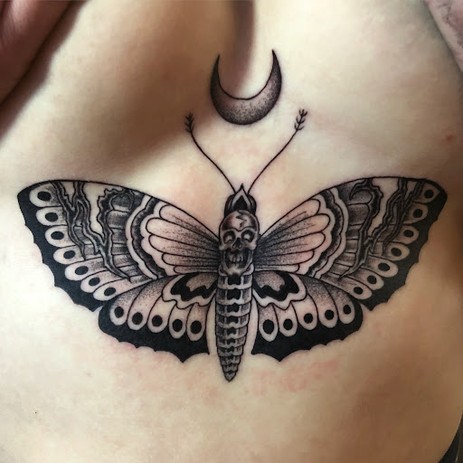 Explore mens upper back tattoo ideas, creative tattoo ideas in Georgetown, available at Iron Rite Tattoo South