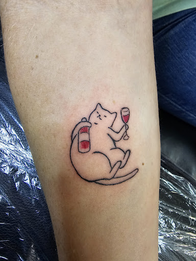 Explore inner forearm tattoo cover up ideas, creative tattoo ideas in Angola, available at Hoodlum Ink