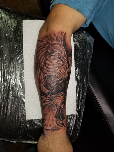 Explore broken chain tattoo ideas, creative tattoo ideas in Conway, available at Primal Urge Tattoos