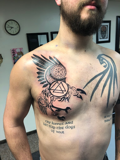 Explore cover up tattoo ideas on chest, creative tattoo ideas in Jefferson, available at Slammin Ink Tattoo