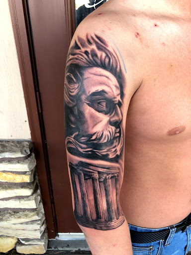 Explore gangsta tattoo ideas, creative tattoo ideas in Roscoe, available at Elevated Ink Tattoo