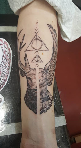 Explore arm tattoo ideas flowers, creative tattoo ideas in Fresno, available at Happy Client Tattoo