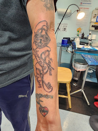 Explore butterfly and rose tattoo ideas, creative tattoo ideas in Colonial Heights, available at Connellys Tattooing