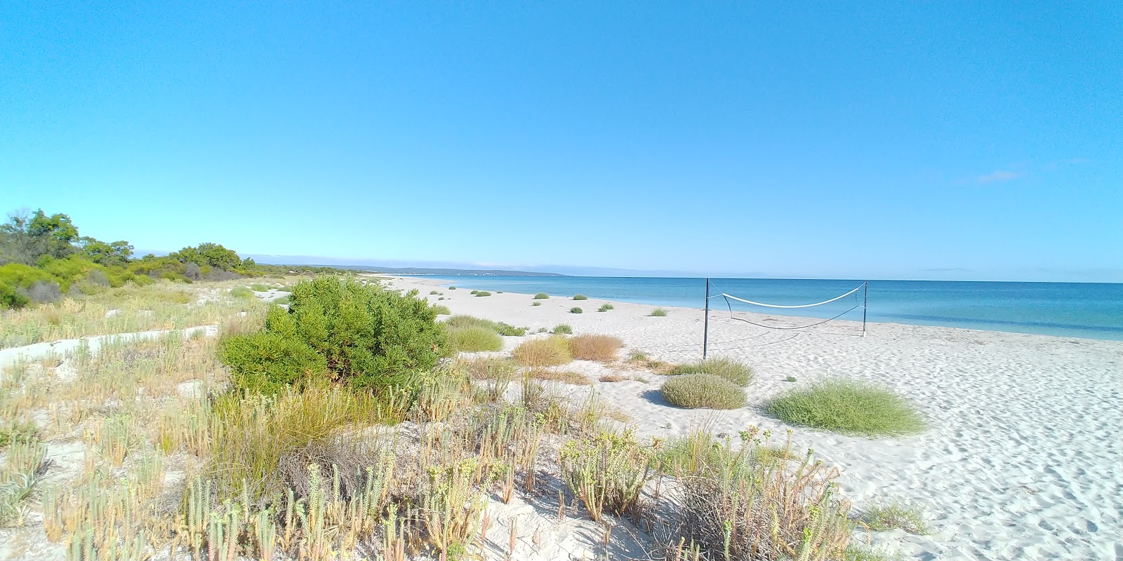 Foto von Wyndham Beach mit beiger sand Oberfläche