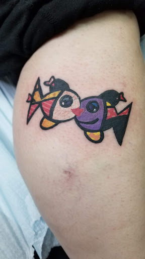 Explore music tattoo ideas for females, creative tattoo ideas in Arlington, available at Urbans Tattoo & Piercing Studio