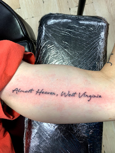 Find camping tattoo ideas for your next unique tattoo in San Antonio at Ink & Iron Tattoos & Piercings