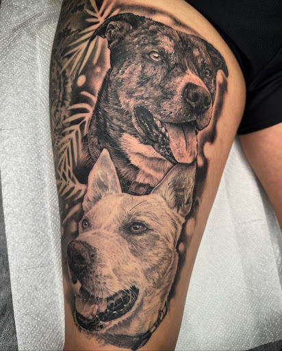 Explore black and grey sleeve tattoo ideas, creative tattoo ideas in Lakeview, available at Backwoods Tattoo Studio