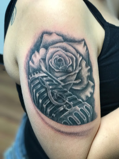 Explore hand tattoo ideas for man, creative tattoo ideas in Amarillo, available at Tattoo Spa LLC
