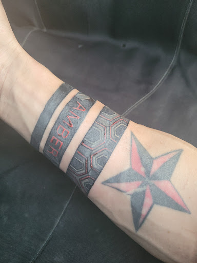 Explore cover up tattoo ideas for upper back, creative tattoo ideas in Boaz, available at Skin Deep Tattoo & Piercing Studio