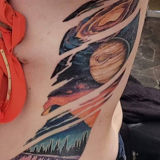 Explore dead space tattoo ideas, creative tattoo ideas in Southampton, available at Serenity Body Arts