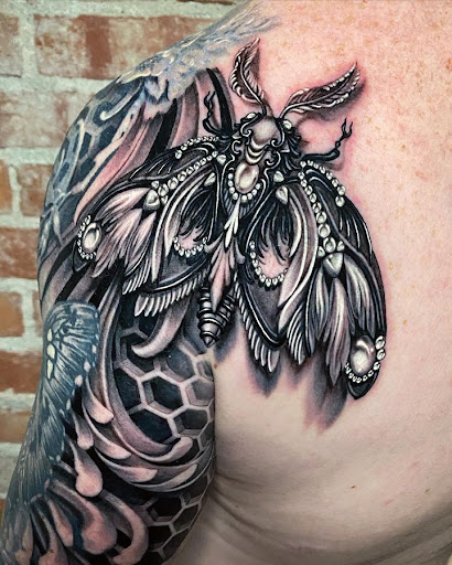 Explore round tattoo ideas, creative tattoo ideas in Grand Junction, available at Elysium Studios