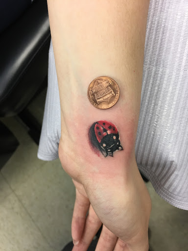 Explore colorful sleeve tattoo ideas, creative tattoo ideas in Fargo, available at Golden Dragon Tattoo