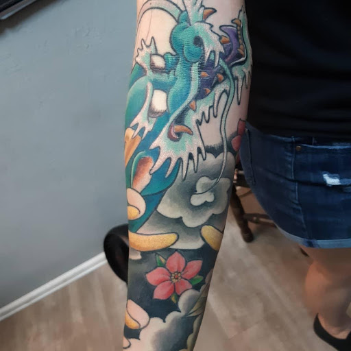 Find addams family tattoo ideas for your next unique tattoo in Colorado Springs at West Side Tattoo