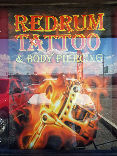 Explore dominican flag tattoo ideas, creative tattoo ideas in Fort Mohave, available at RedRum Tattoo & Body Piercing Co.