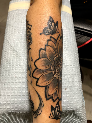 Explore oshun tattoo ideas, creative tattoo ideas in Cape Coral, available at UNRIVALED INK