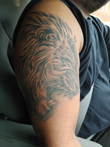 Explore coy fish tattoo ideas, creative tattoo ideas in Warner Robins, available at McDonald Ink