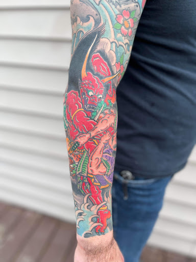 Find sakura tattoo ideas for your next unique tattoo in Pikeville at Sacred Mountain Tattoo
