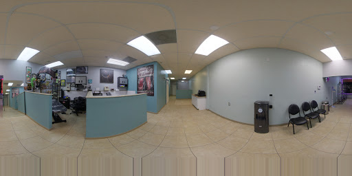 Tattoo Shop «Dungeon Body Piercing & Tattoos», reviews and photos, 10014 University Blvd, Orlando, FL 32817, USA