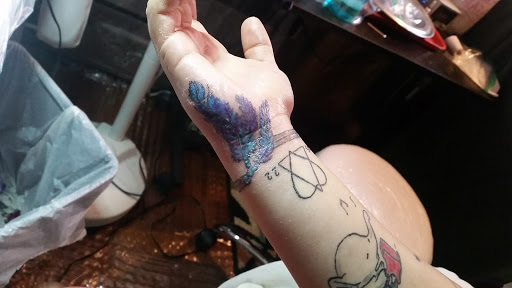 Explore baby boy tattoo ideas, creative tattoo ideas in Davis, available at SIX GUN SOUND TATTOO