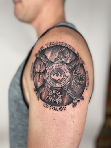 Explore tattoo ideas for siblings, creative tattoo ideas in Winter Park, available at Golden Tarot Ink Club