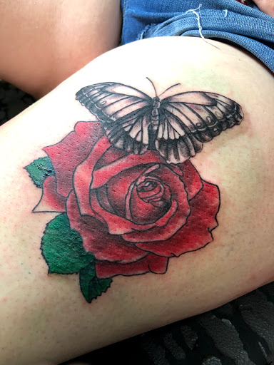Explore full neck tattoo ideas for men, creative tattoo ideas in Okeechobee, available at Muck City Tattoos & Piercings