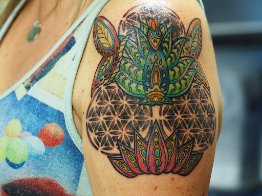 Explore cyberpunk edgerunners tattoo ideas, creative tattoo ideas in Springfield, available at Poke and a Rub art studio