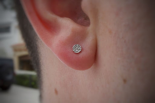 Explore tattoo ideas for behind the ear, creative tattoo ideas in Corona Del Mar, available at Rainbow Piercing & Jewelry