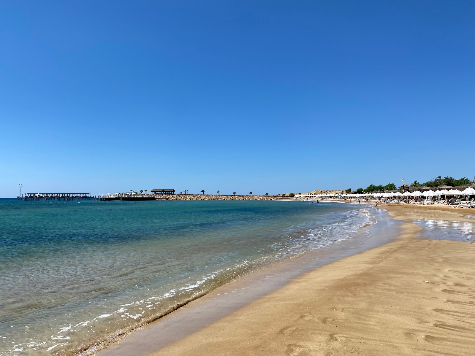 Concorde Beach的照片 带有米色沙子表面