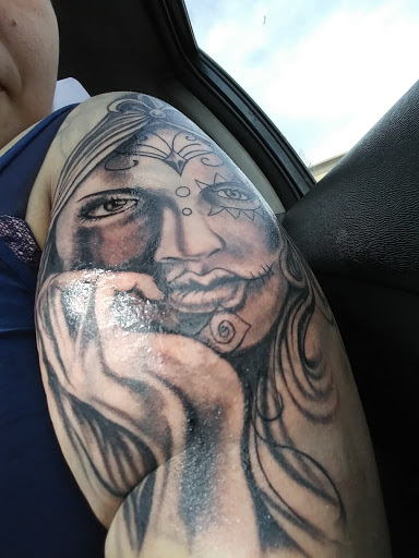 Find guy best friend tattoo ideas for your next unique tattoo in Scottsboro at 5 Points Tattoo