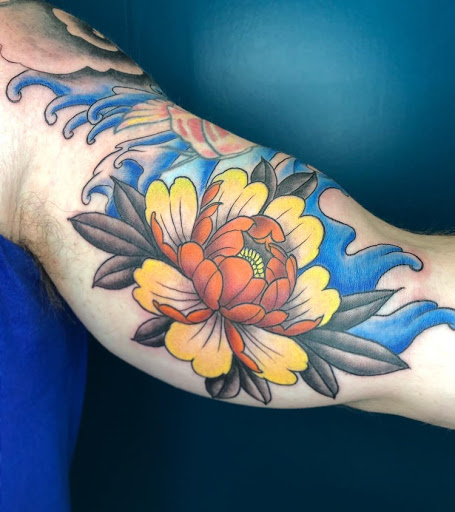 Explore book lover tattoo ideas, creative tattoo ideas in Buford, available at Wild Tribe Tattoos and Piercings