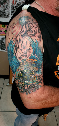 Explore mens foot tattoo ideas, creative tattoo ideas in Englewood, available at The Original Big Daddy Tattoo & Body Piercing est.1997 est.1997