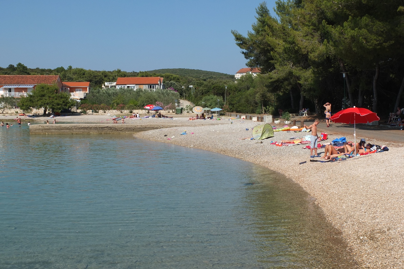 Denka beach'in fotoğrafı küçük koy ile birlikte