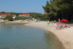 Denka beach'in fotoğrafı küçük koy ile birlikte