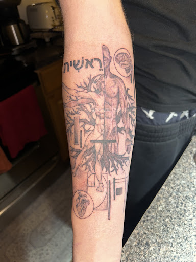 Explore the hobbit tattoo ideas, creative tattoo ideas in Prince Frederick, available at Red Octopus Tattoos