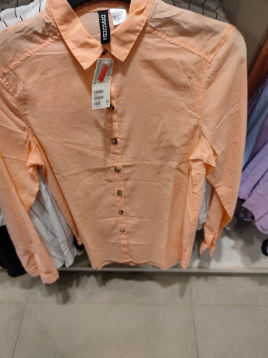 Stores to buy women's white shirts Cairo
