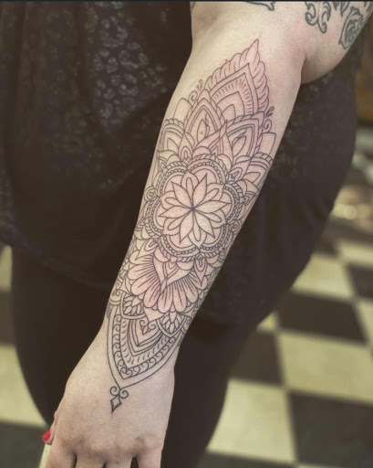Explore manatee tattoo ideas, creative tattoo ideas in Stevens Point, available at Black Rabbit Tattooing