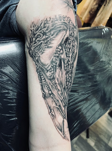 Explore tattoo ideas for dark skin guys, creative tattoo ideas in Warner Robins, available at Untold Pain Tattoo Studio