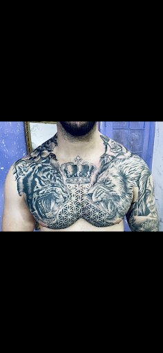 Explore magician tattoo ideas, creative tattoo ideas in Fort Myers, available at Loyal 2 The Coil Tattoos & Piercings (Edison Mall Location Entrance F)