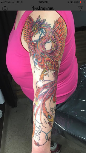 Find gym tattoo ideas for men for your next unique tattoo in Dover at Walls of Wonder Tattoo And Body Piercing