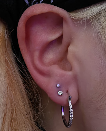 Explore cover up ideas for big tattoos, creative tattoo ideas in Ypsilanti, available at Michigan Avenue Tattoo & Piercing