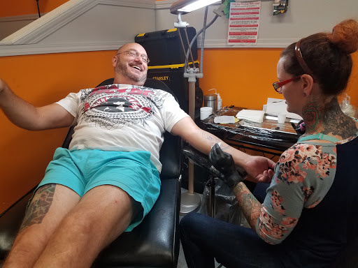 Explore catholic tattoo ideas, creative tattoo ideas in Pensacola, available at Infinite Ink Tattoo Studio