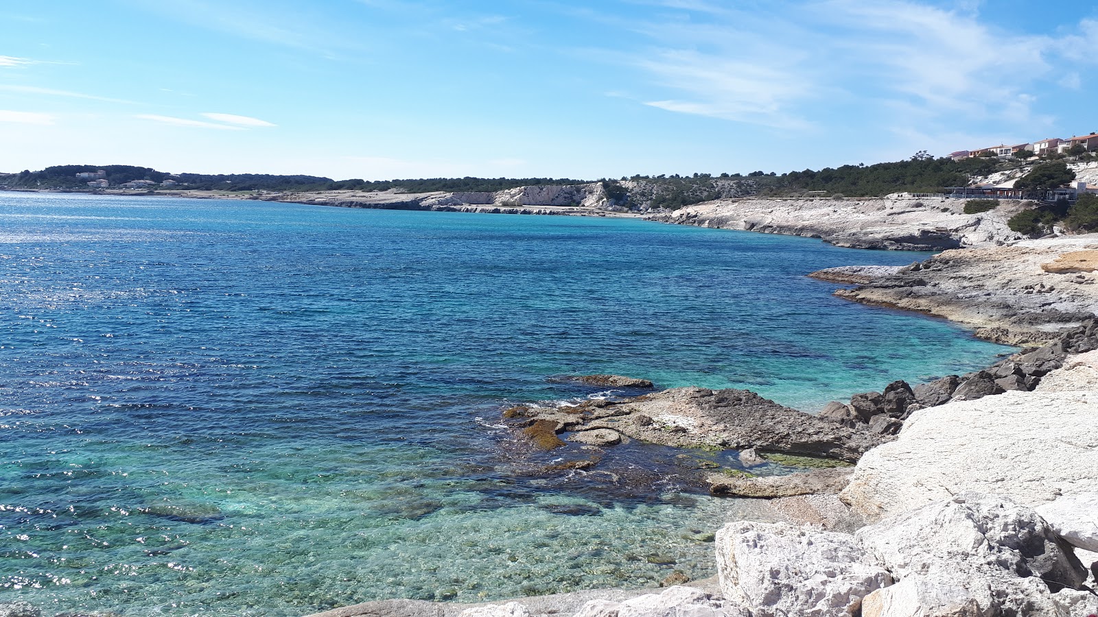 Foto van Anse du Petit Nid met kleine baai