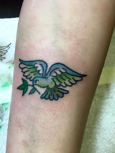 Find tummy tuck tattoo ideas for your next unique tattoo in Benton at Relics Tattoo Studio